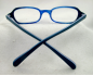 Lunettes loupes rectangles bleu et branches bicolores